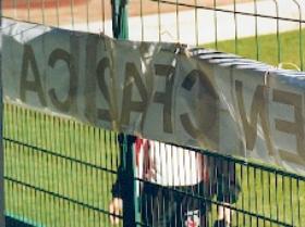Fans Anti-Bras banner, ripped up by club offical