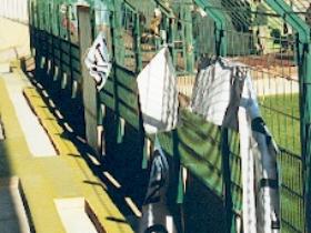 Fans Anti-Bras banner, ripped up by club offical