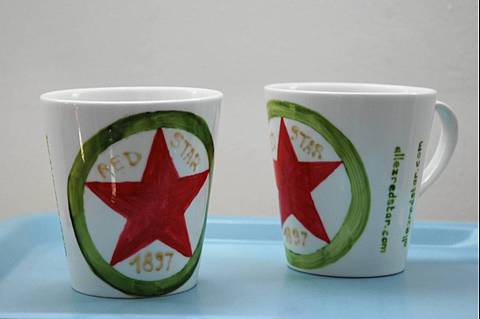  individually hand-painted mugs, priced at ten euros each, 